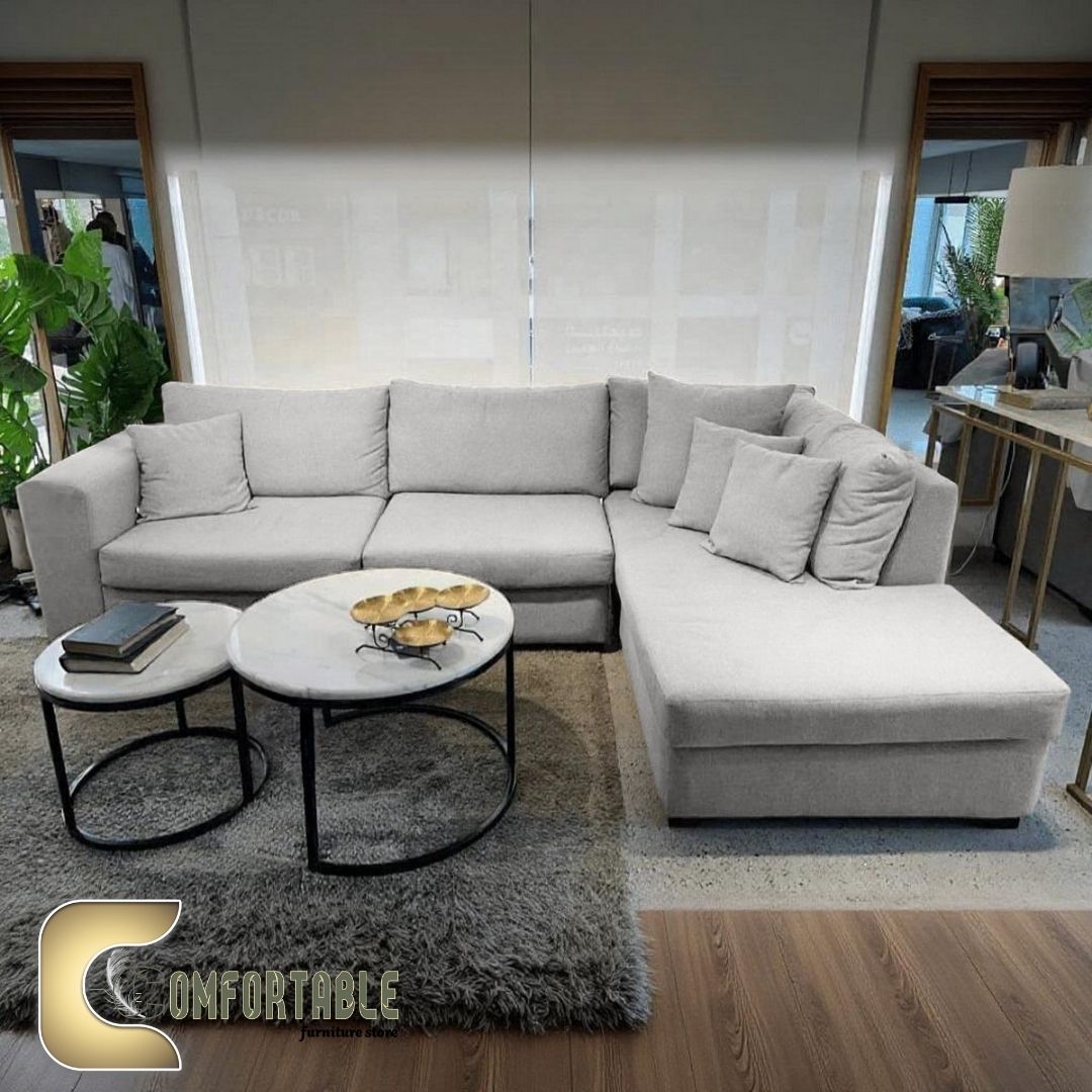 ركنة مودرن L Shape Sofa من خشب الزان – Comfortable Furniture ركنة أنيقة على شكل L Shape Sofa مصنوعة من خشب الزان الأحمر الطبيعي (Solid Beech Wood) المعروف بقوته ومتانته. مزودة بحشوة داخلية من High Density Foam لضمان أقصى درجات الراحة والمتانة. يمكنك الاختيار بين مجموعة متنوعة من الأقمشة والألوان (Fabric & Colors) لتناسب ذوقك وديكور منزلك العصري. منتج مقدم من Comfortable Furniture Store ليجمع بين الفخامة والجودة العالية.