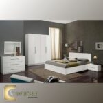 غرفة نوم شبابي مودرن مكونة من سرير ودولاب وتسريحة بتصميم انسيابي وأنيق.