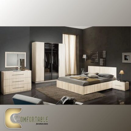 غرفة نوم شبابي مودرن مكونة من سرير ودولاب وتسريحة بتصميم انسيابي وأنيق.